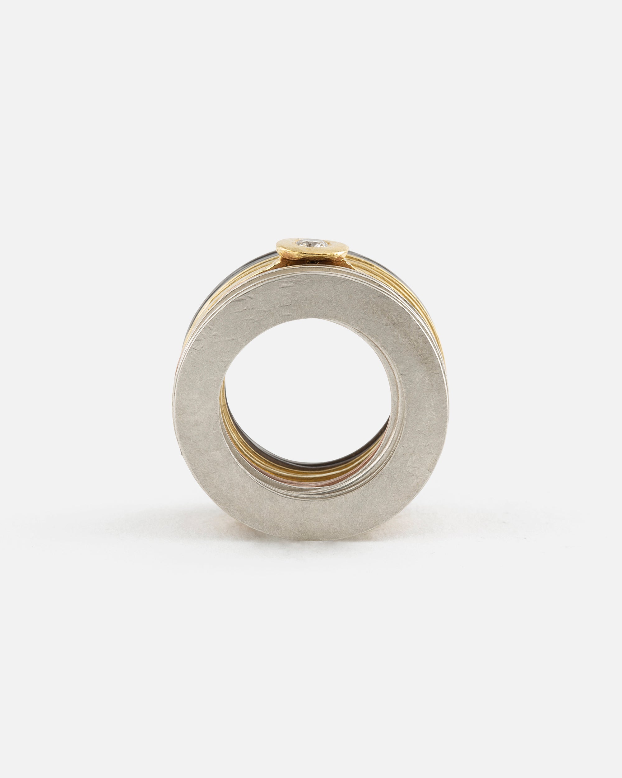 Disc Ring in 4 metals with Diamond
