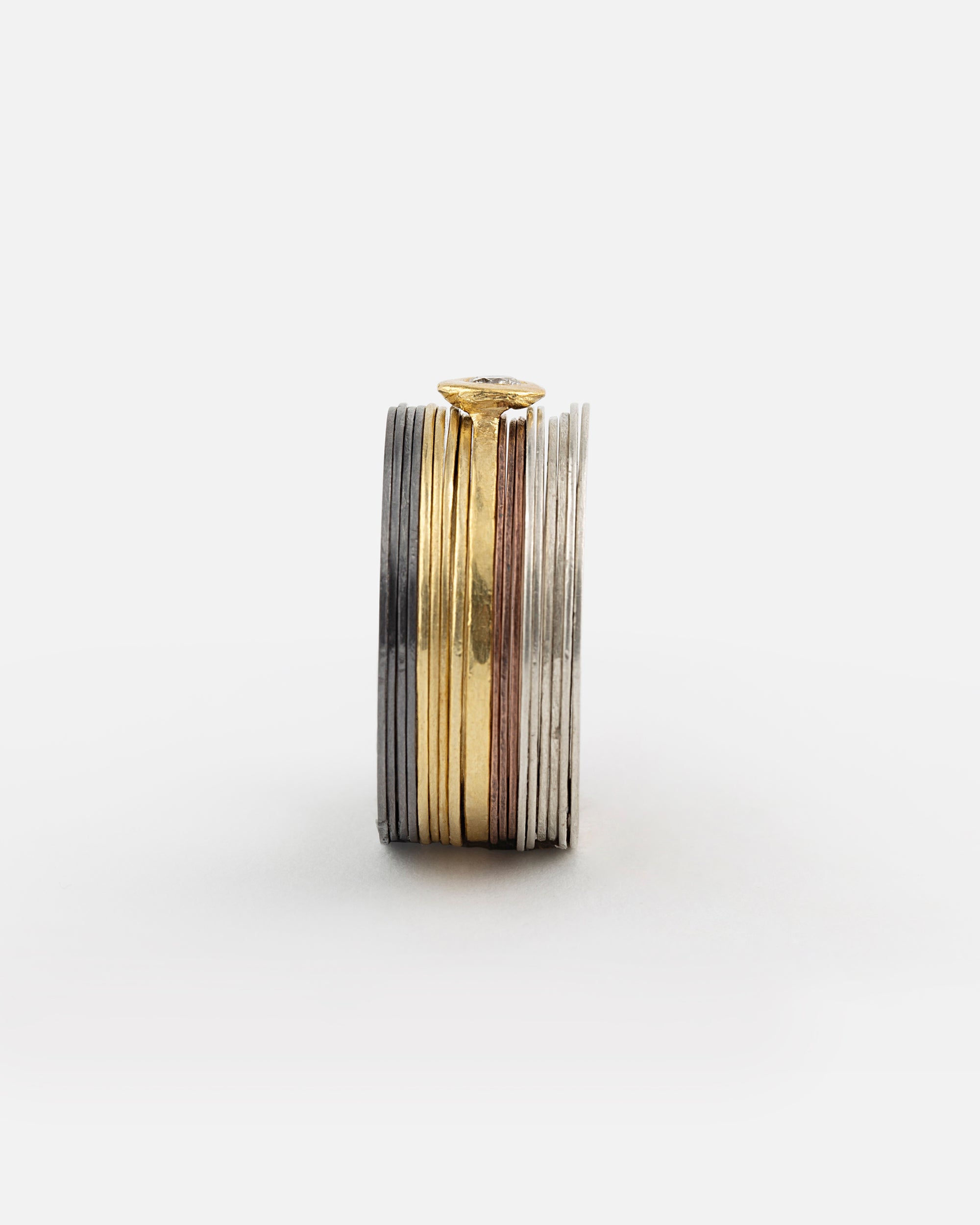 Disc Ring in 4 metals with Diamond